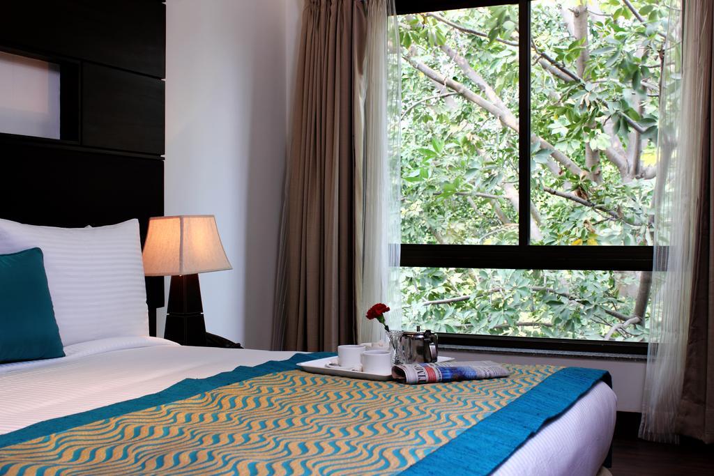 Stately Suites Mg Road Gurgaon Zimmer foto